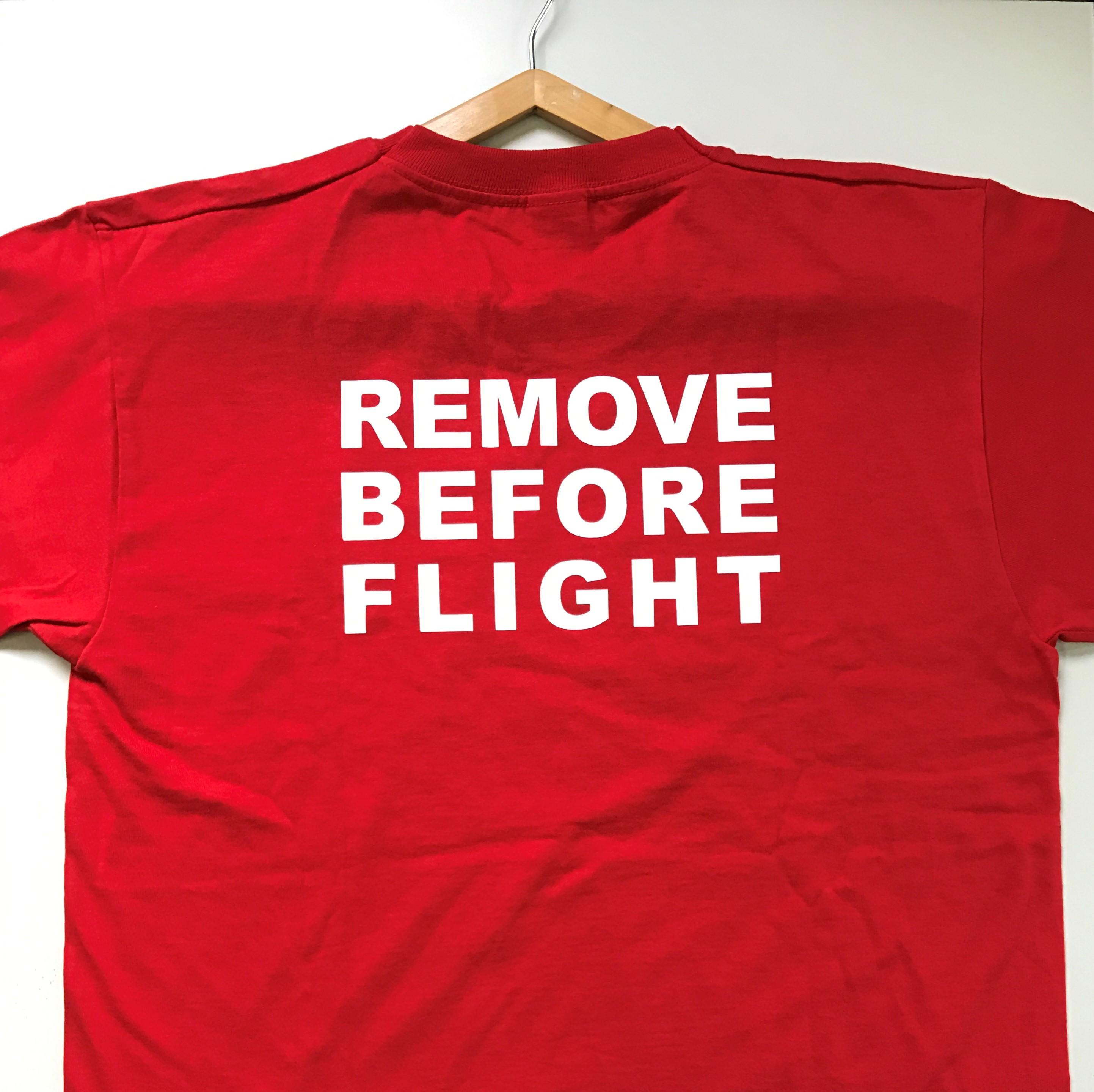 TEE SHIRT REMOVE BEFORE FLIGHT (dos) TAILLE L